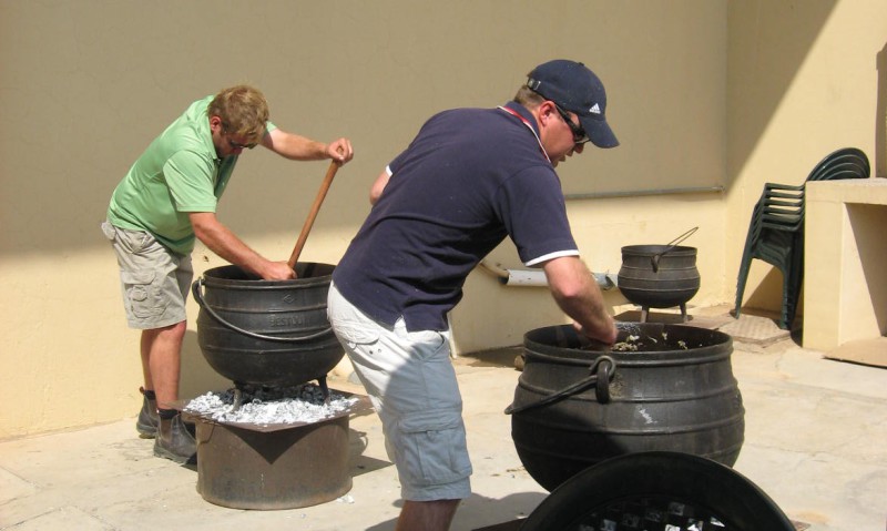 Hours and hours and countless singed leg hairs go into the preparation of the Hansa Fish River Canoe Marathon's the legandary Thursday night potjie.